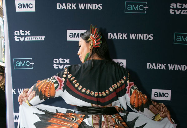 Dark Winds actor Amelia Rico (Ada Growing Thunder), wearing a wrap by J. Okuma and an earring by Tochtli Wear. 